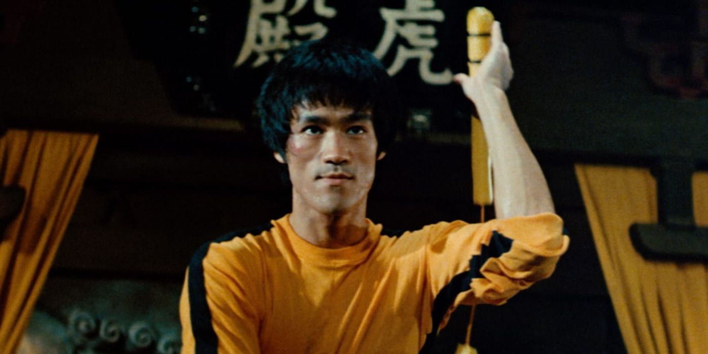 Bruce Lee wielding nunchaku