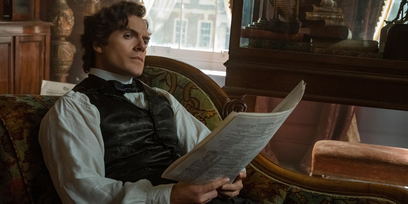 Henry Cavill as Sherlock Holmes reading a newspaper in Enola Holmes 2