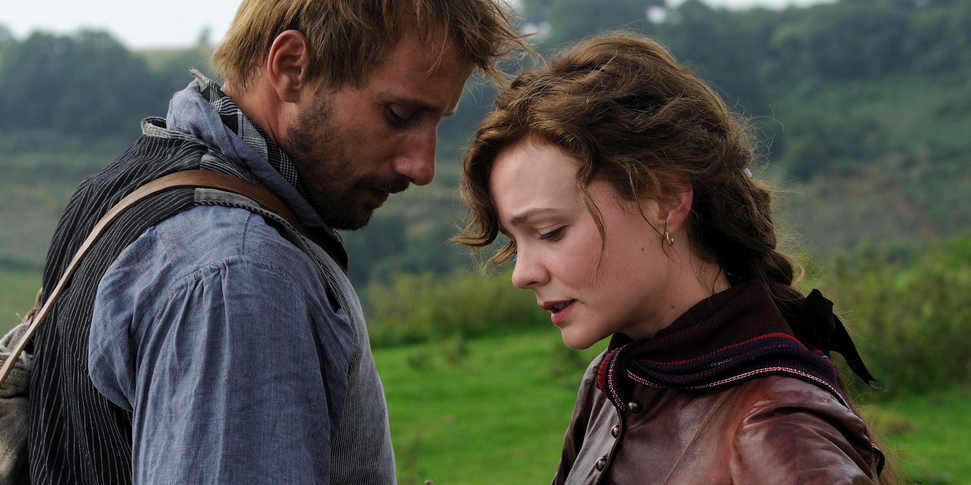 Matthias Schoenaerts and Carey Mulligan as Gabriel and Bathsheba meeting in an open field in Far From the Maddening Crowd.