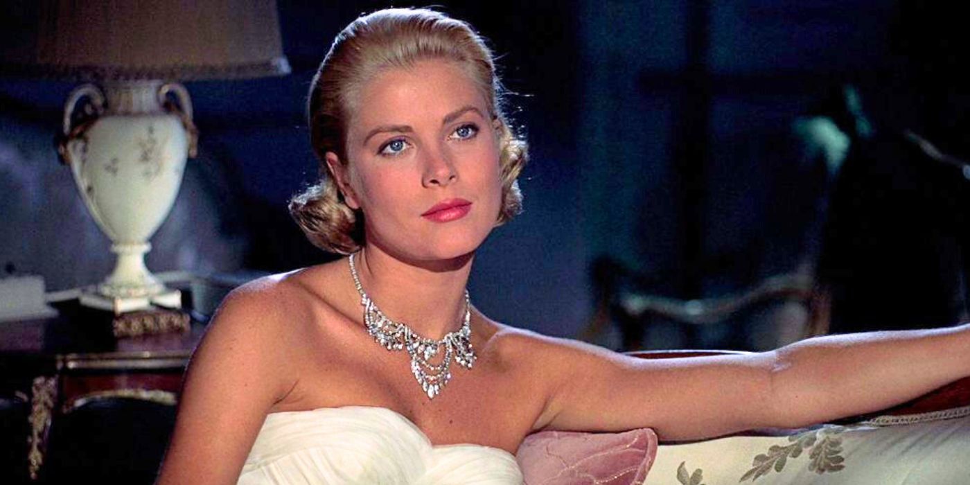 Grace Kelly sitting on a couch in To Catch a Thief (1955)-1