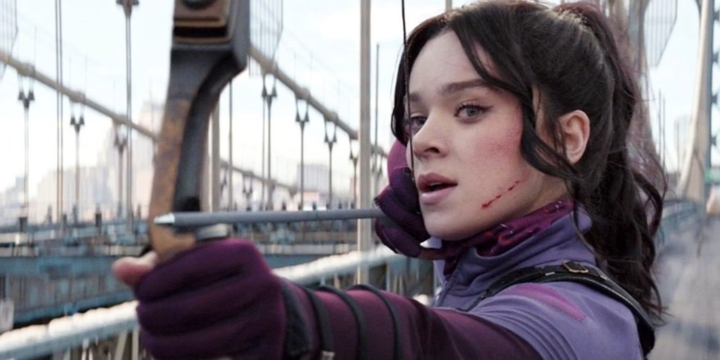 Hailee Steinfeld as Kate Bishop holding and aiming her bow and arrow in Hawkeye