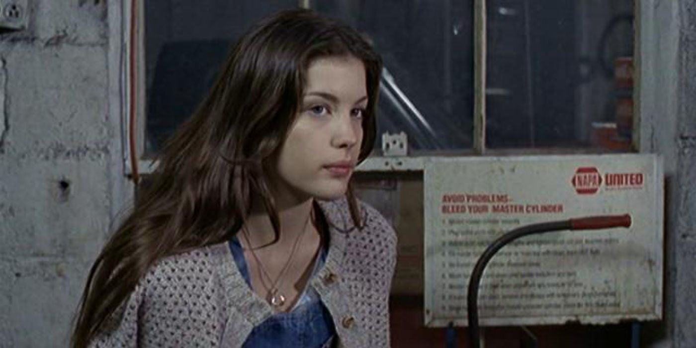 Young Liv Tyler as Callie sitting in Heavy 