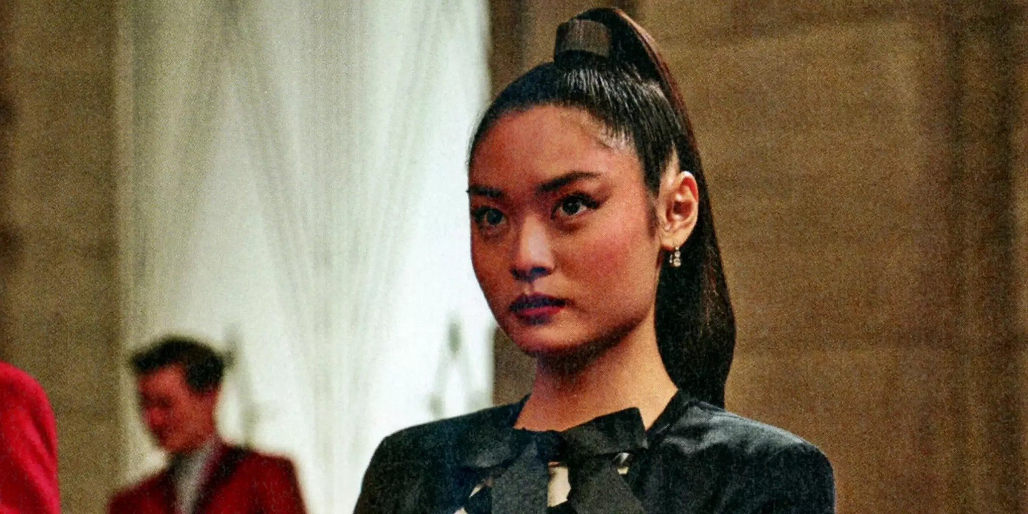 A still of the character Clemensia Dovecote, played by Ashley Liao, in The Hunger Games: The Ballad of Songbirds and Snakes