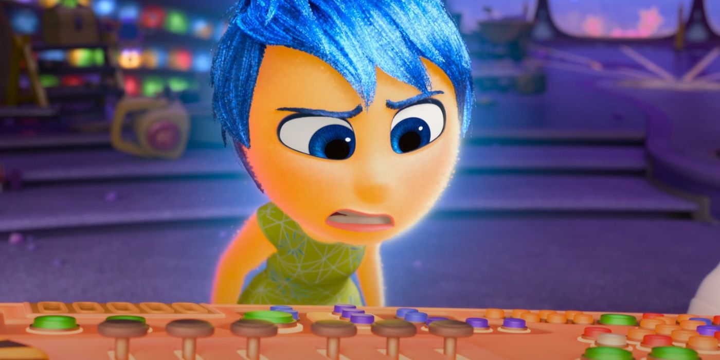 Joy (Amy Poehler) looking at the new orange control panel in Inside Out 2.