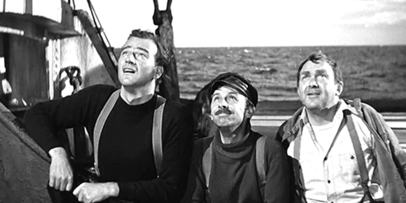John Wayne, John Qualen and Thomas Mitchell looking up at the sky on a ship in The Long Voyage Home (1940)