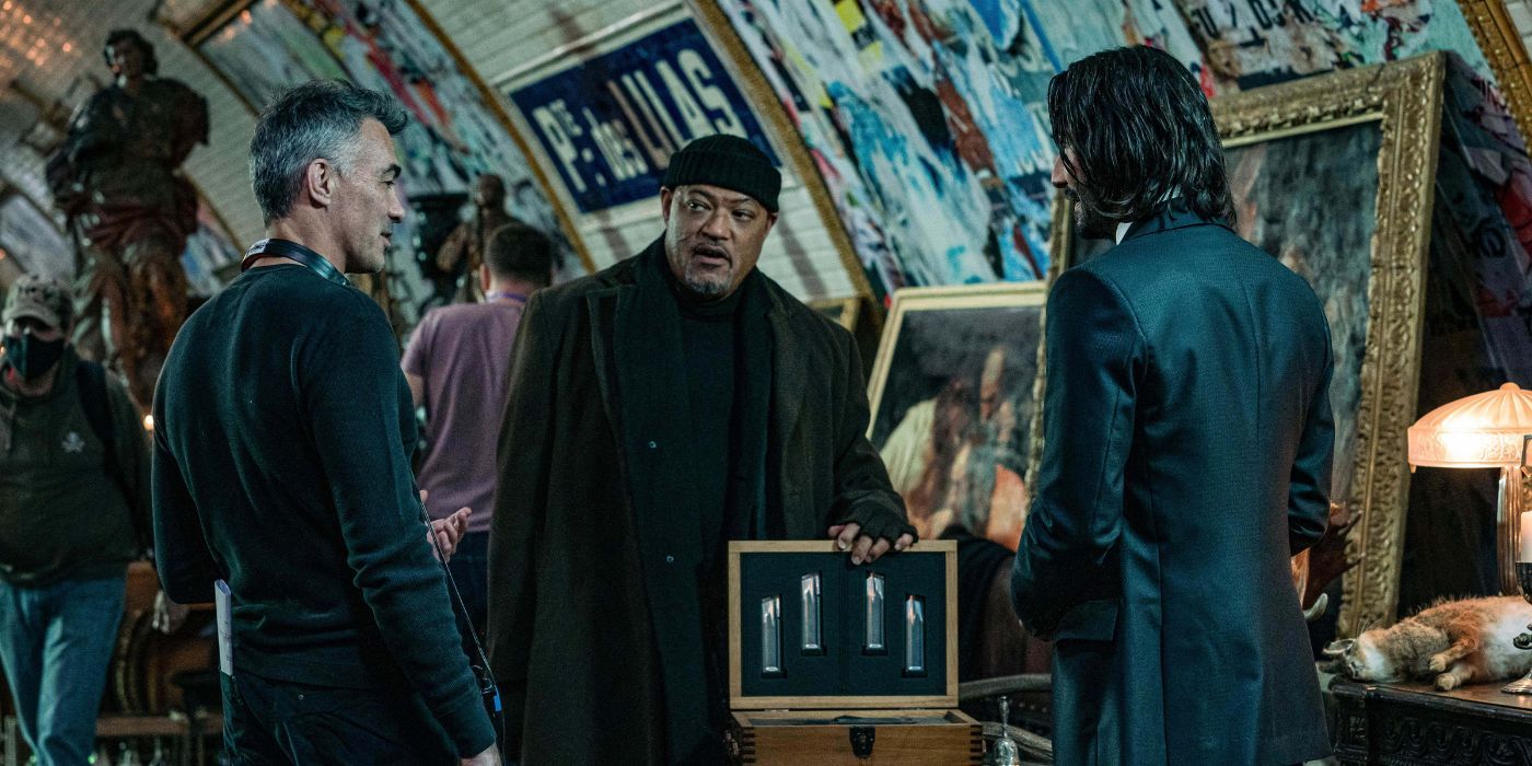 Chad Stahelski talking with Laurence Fishburne and Keanu Reeves on the set of John Wick: Chapter 4
