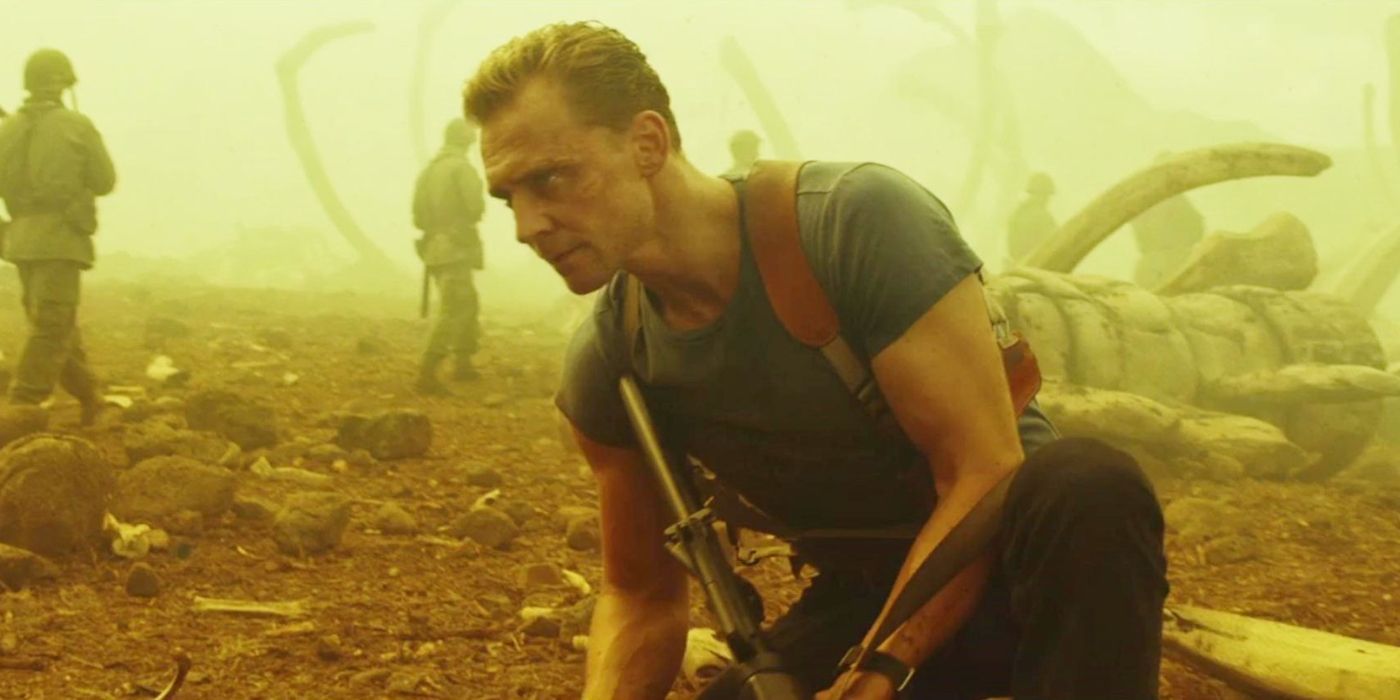 Tom Hiddleston kneeling among giant bones in Kong: Skull Island