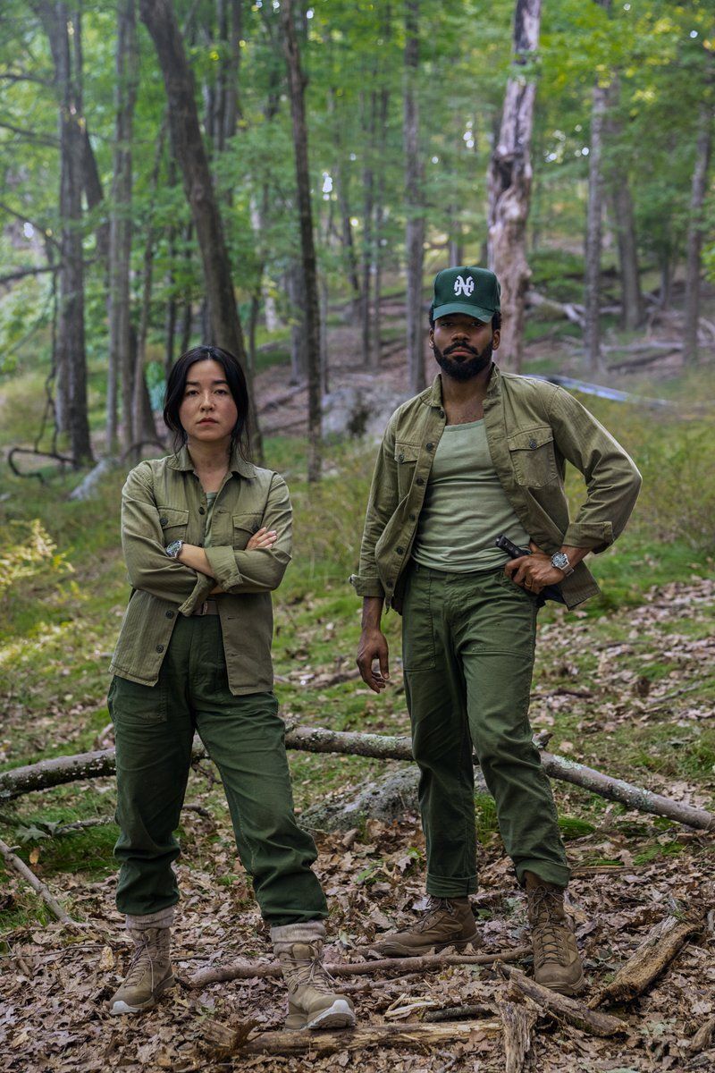 Mr. and Mrs. Smith TV Show Donald Glover and Maya Erskine in the woods