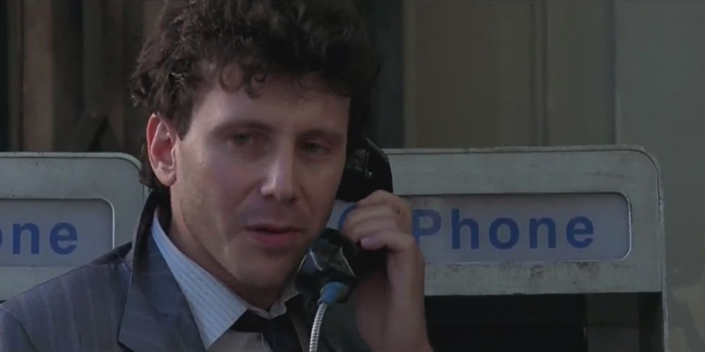 Detective Jeffrey Friedman (Paul Reiser) talking on the phone in Beverly Hills Cop II