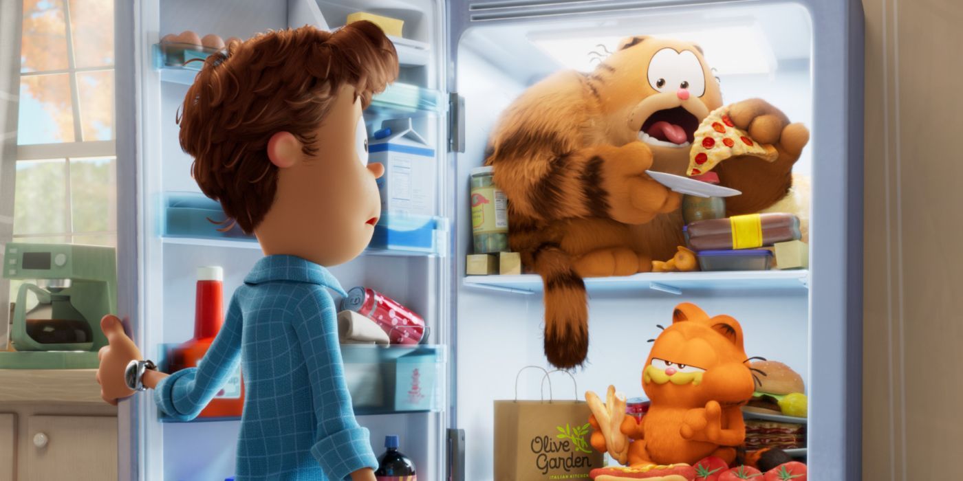 Jon Arbuckle stares at Garfield (Chris Pratt) and Vic (Samuel L. Jackson) raiding the refrigerator