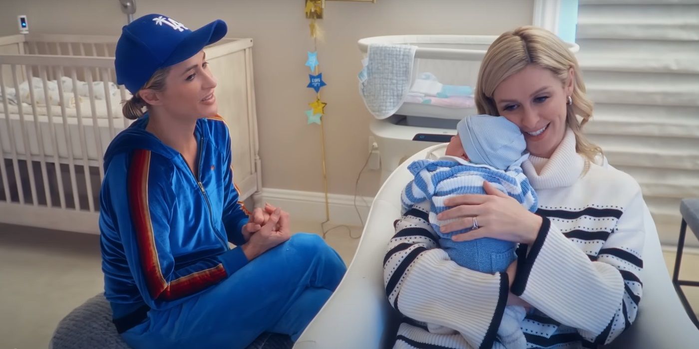 Nicky Hilton cradling Paris Hilton's baby son Phoenix in Season 2 of Paris in Love