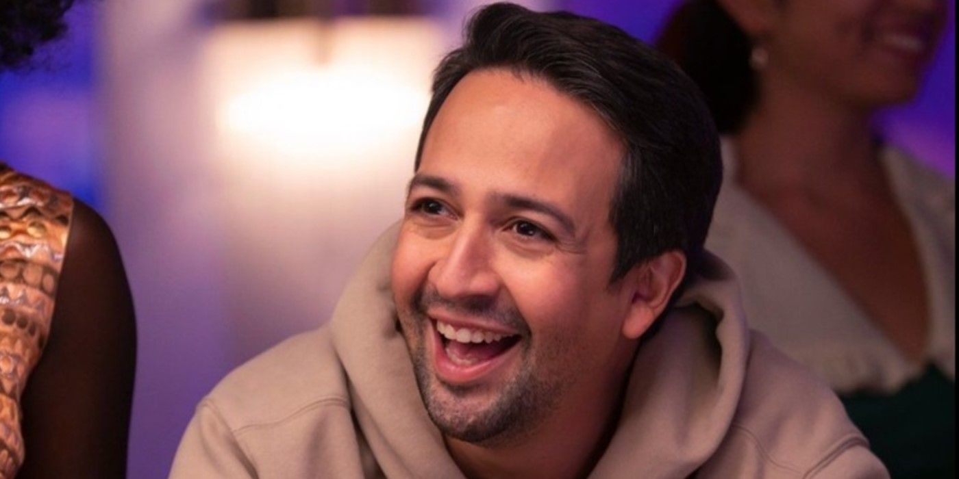 Lin-Manuel Miranda as Hermes laughing in Percy Jackson and the Lightning Thief