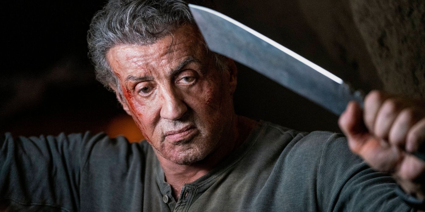 John Rambo (Sylvester Stallone) holds up a machete in 'Rambo: Last Blood'