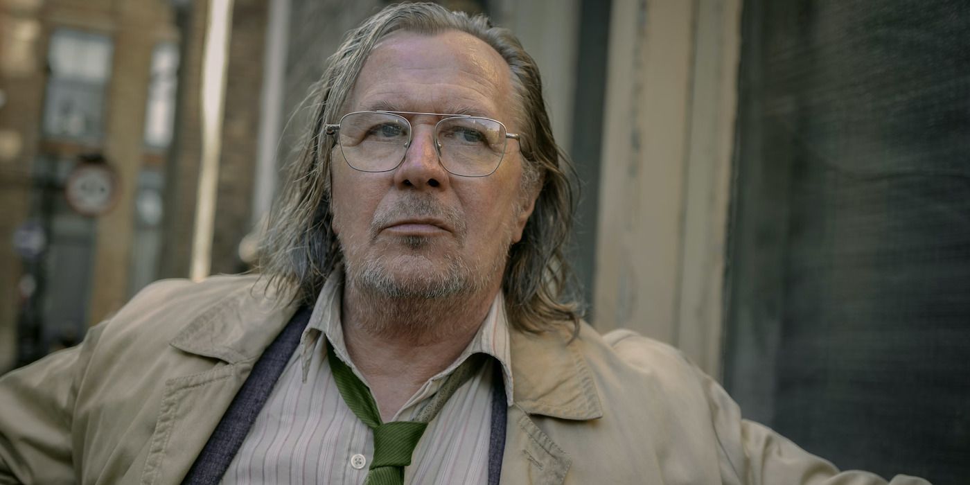 Gary Oldman as Jackson Lamb looking off into the distance in Slow Horses Season 3. 