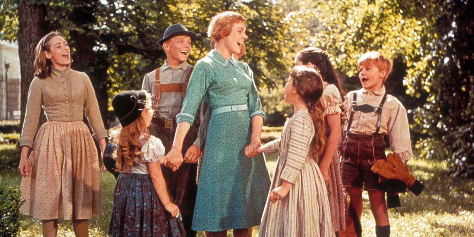 Julie Andrews as Maria in The Sound of Music surrounded by the von Trapp children