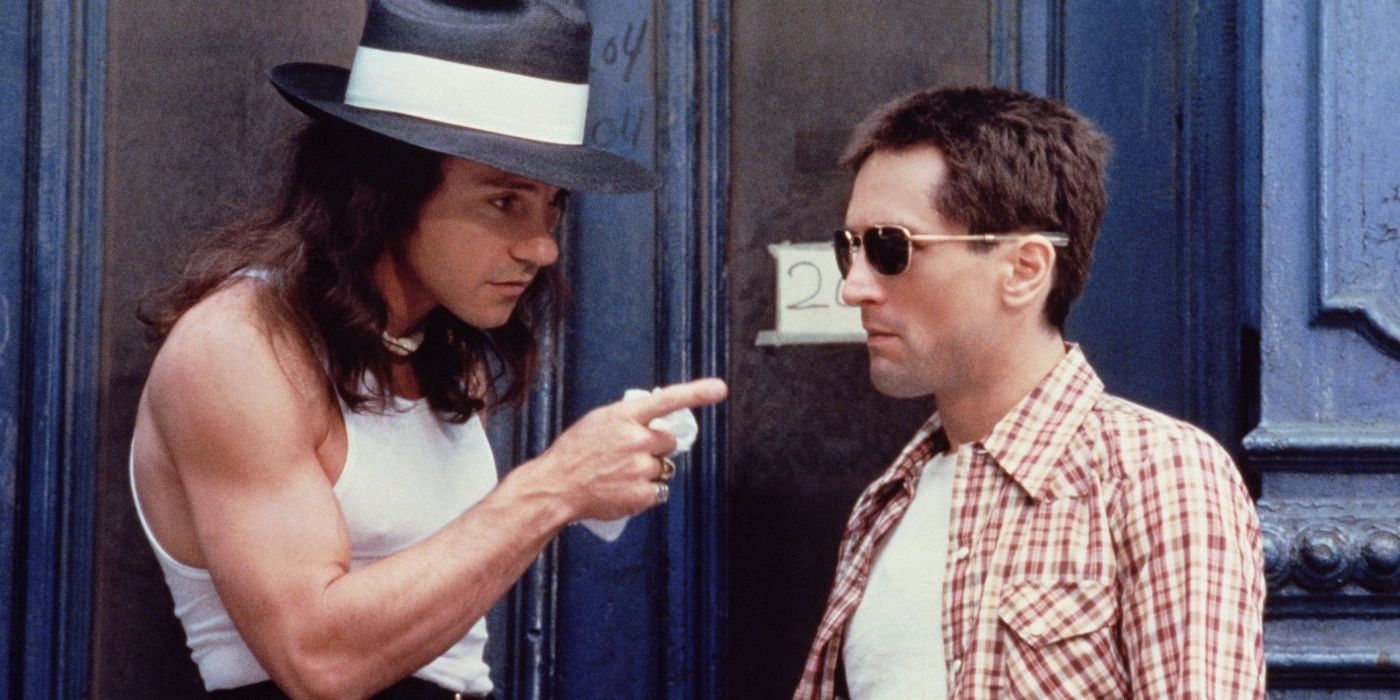 Robert De Niro as Travis Bickle and Harvey Keitel as Matthew "Sport" Higgins in 'Taxi Driver'