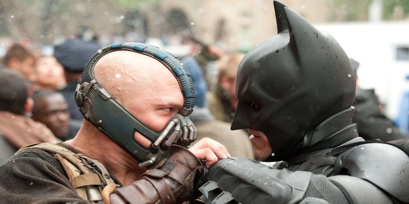Batman and Bane fighting in the street in The Dark Knight Rises