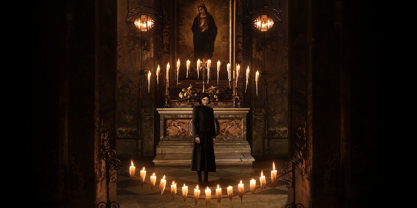 Nell Tiger Free as Sister Margaret surrounded by candles in a Church on a cropped poster for The First Omen