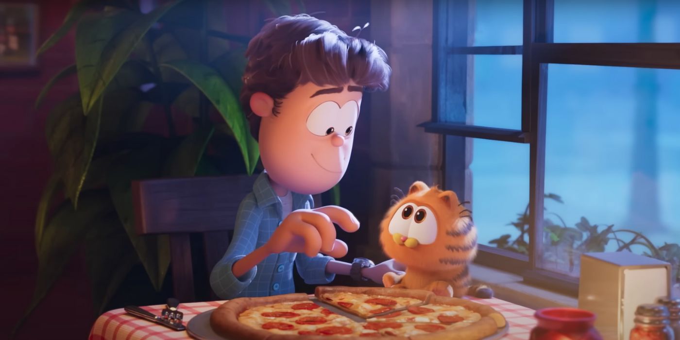Jon Arbuckle and Baby Garfield sharing a pizza in The Garfield Movie
