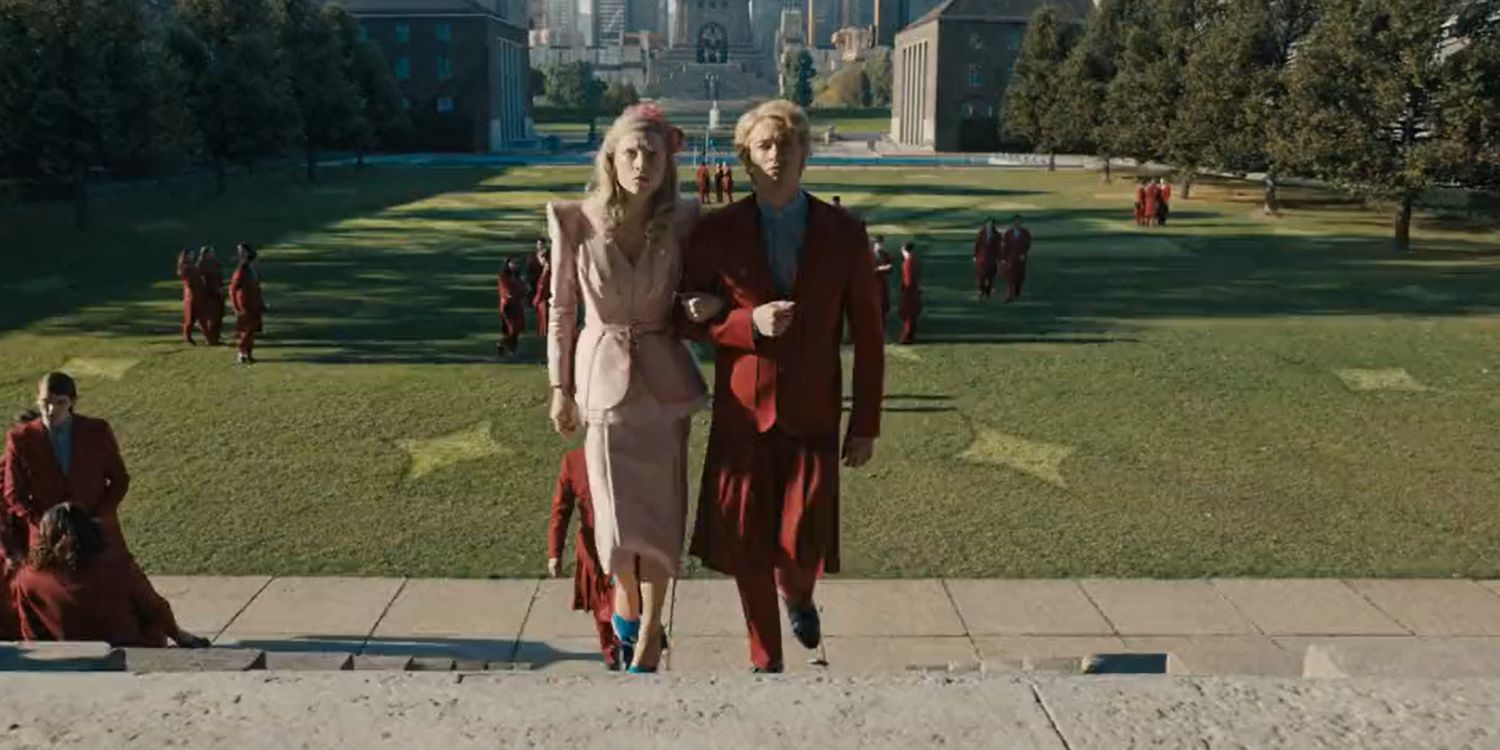 Tigris (Hunter Schafer) and Coriolanus (Tom Blyth) walk arm in arm in 'The Hunger Games: The Ballad of Songbirds and Snakes'