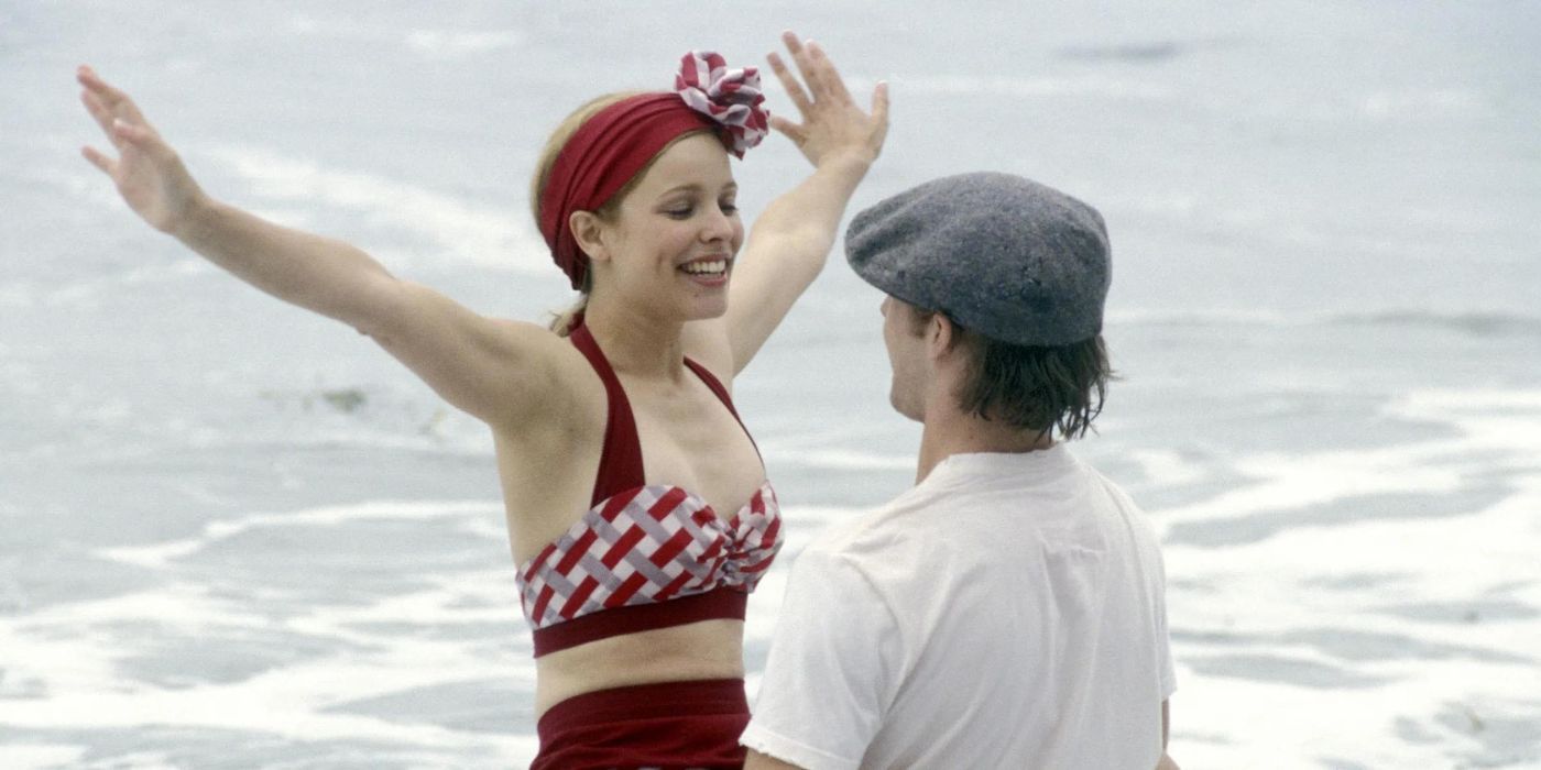 Noah (Ryan Gosling) holding Allie (Rachel McAdams) up in the water, as she smiles with her arms outstretched in The Notebook