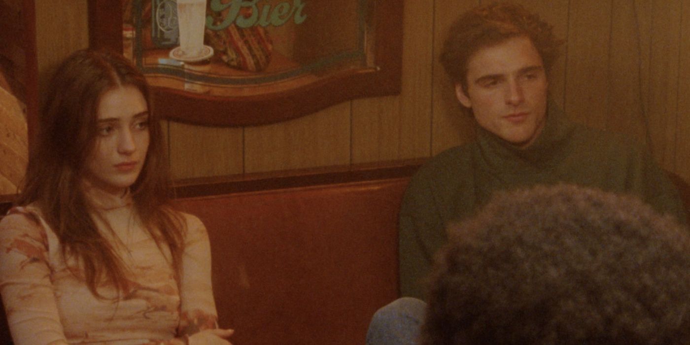  Lillian, portrayed by Talia Ryder, sits in a restuarant next to Ian, played by Jacob Elordi in 'The Sweet East' 