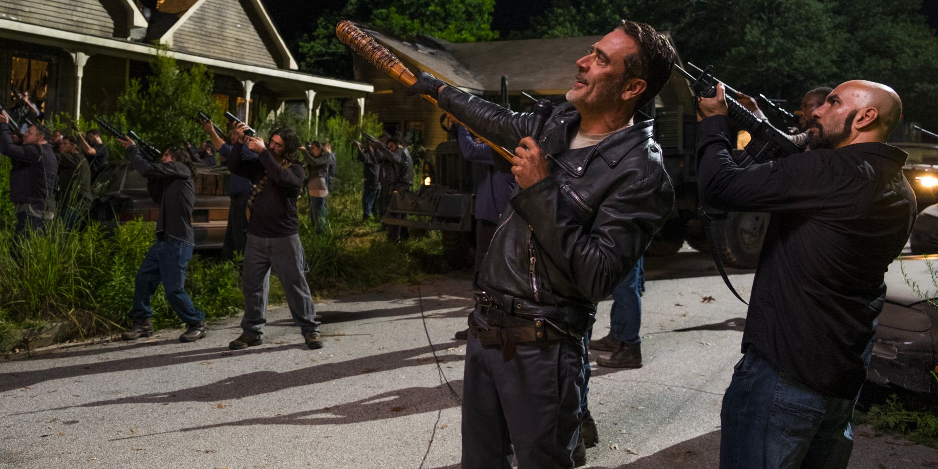 Negan (Jeffrey Dean Morgan) leads his soldiers in an attack on Alexandria while issuing demands into a loudspeaker.