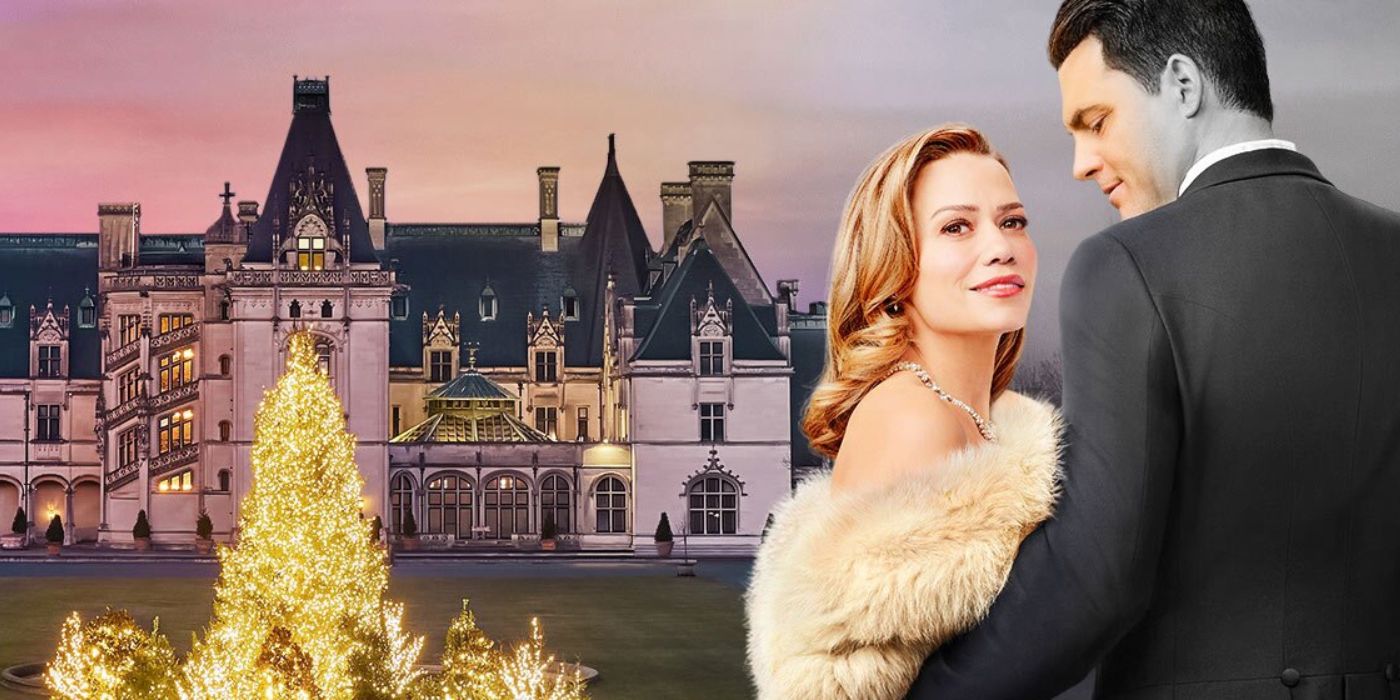 The official poster for Hallmark&rsquo;s A Biltmore Christmas with the Biltmore mansion in the background and Bethany Joy Lutz&rsquo;s Lucy cuddled up to Kristoffer Polaha&rsquo;s Jack in the foreground