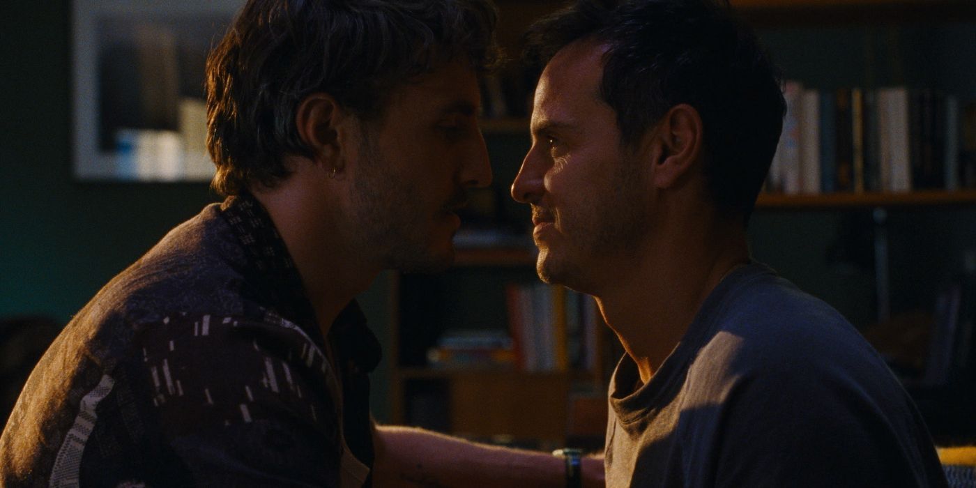 Harry (Paul Mescal) and Adam (Andrew Scott) leaning in to kiss one another in All of Us Strangers.