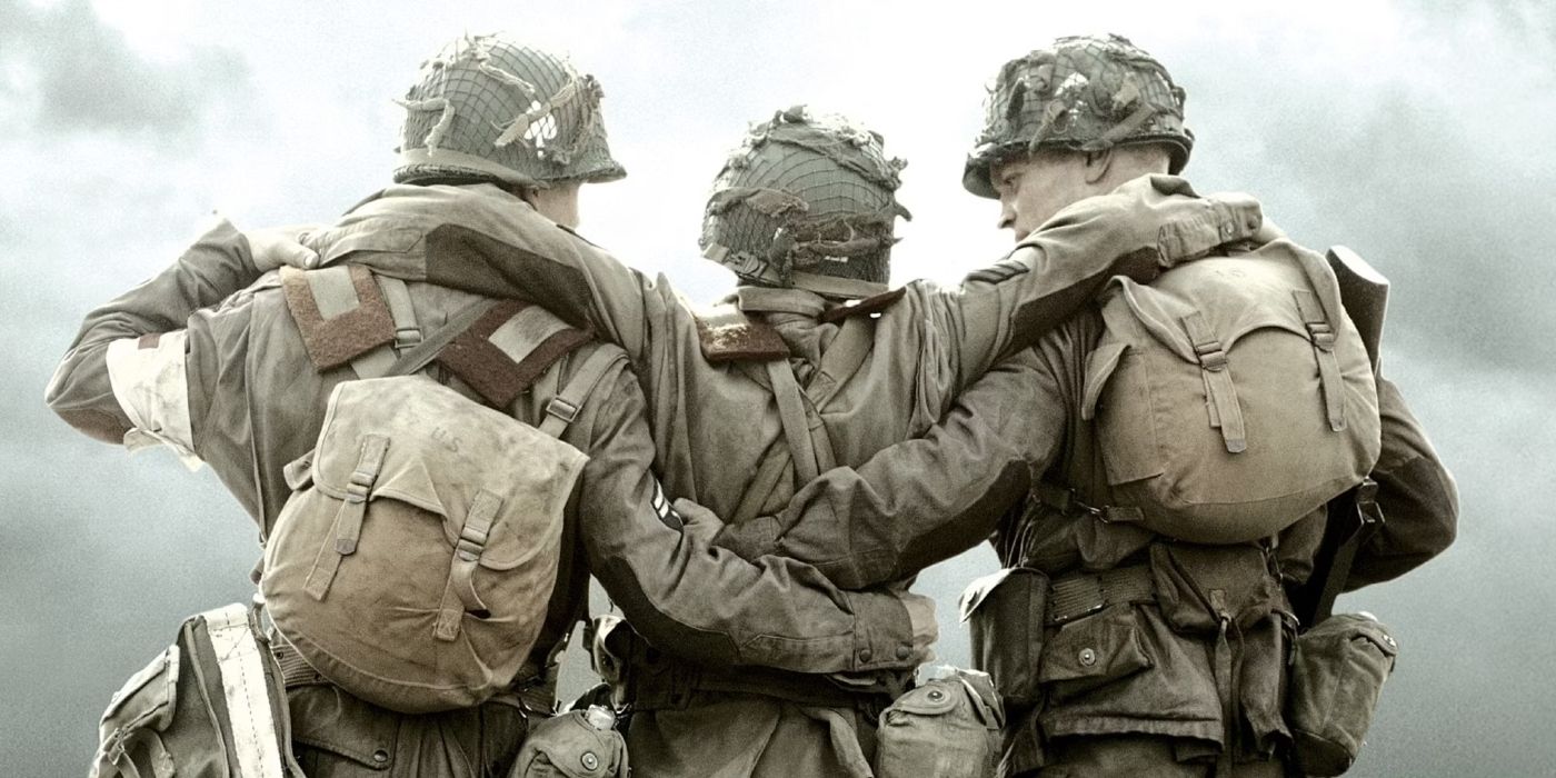 Two soldiers helping a third to walk in 'Band of Brothers' 