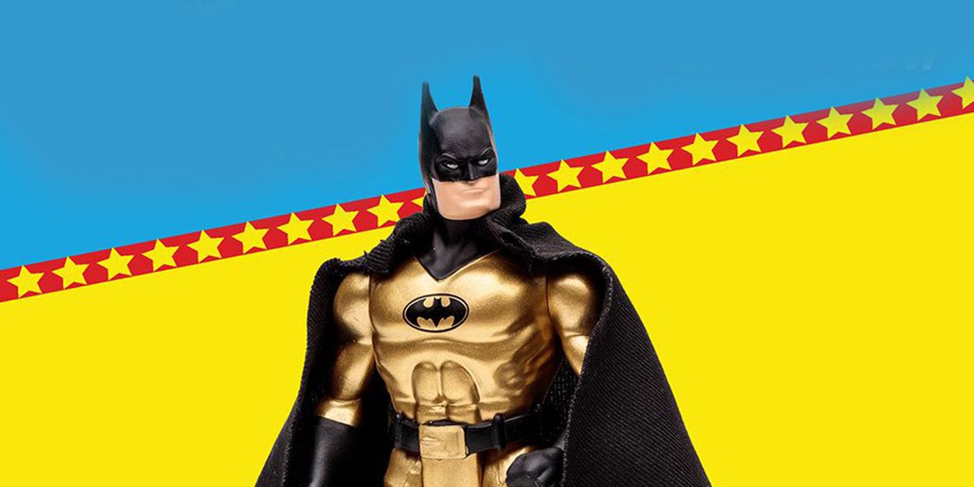 A new batman gold edition action figure from McFarlane Toys against a blue and yellow background.