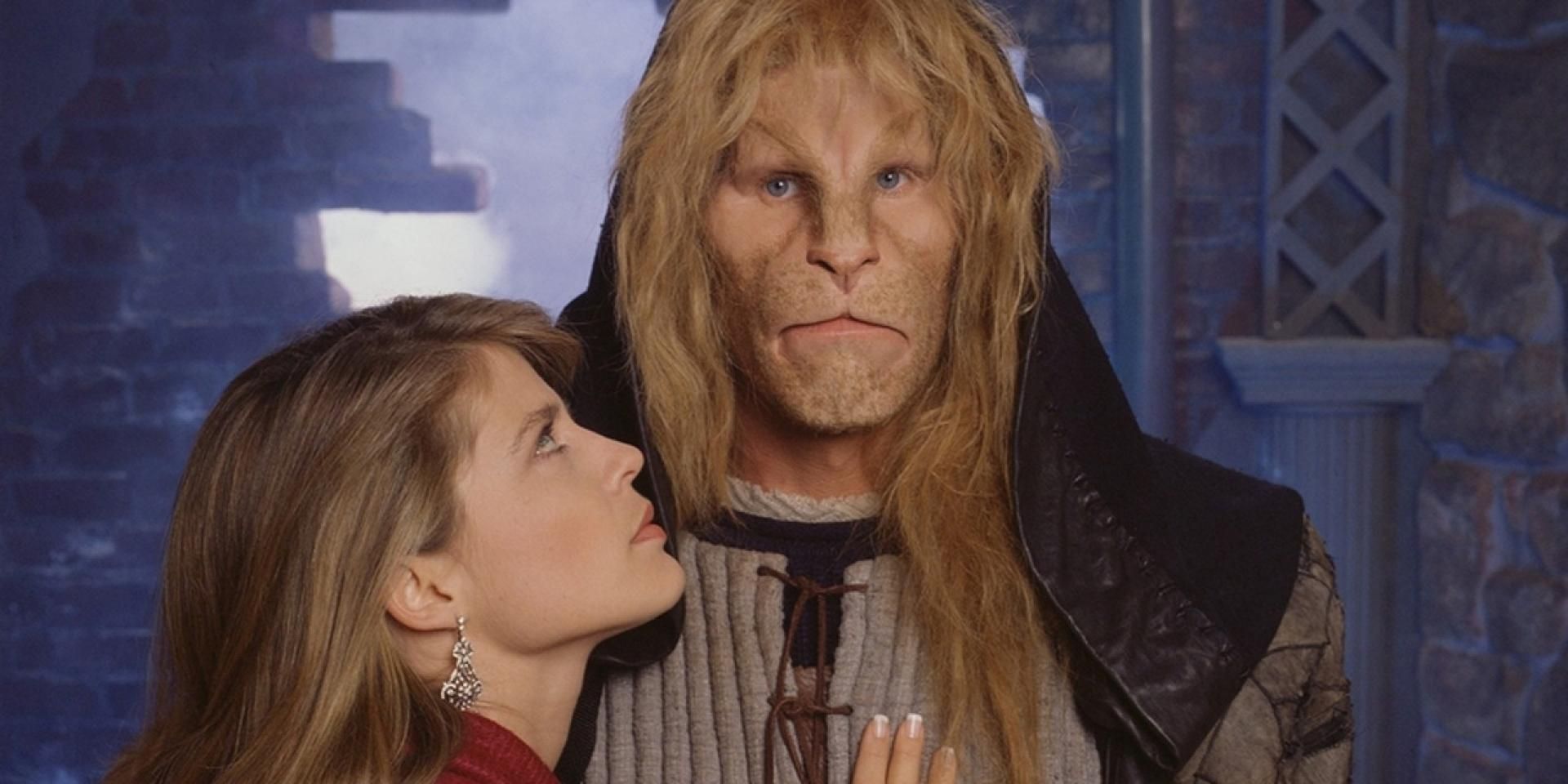 Linda Hamilton's Catherine Staring up at Ron Perlman's Vincent With her Hand On His Chest in Beauty and the Beast