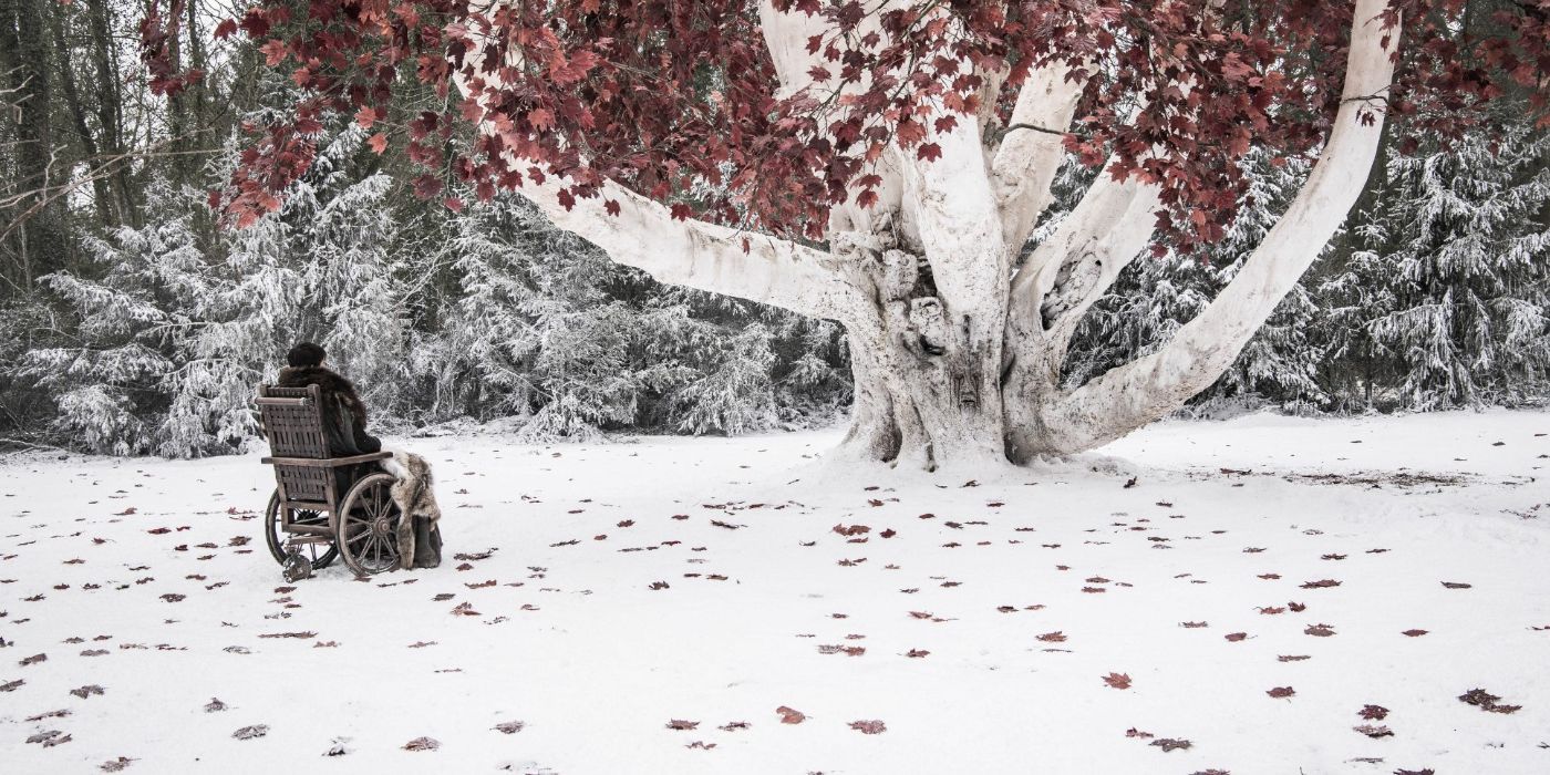 Isaac Hempstead Wright as Bran sitting in front of a weirwood tree in 'Game of Thrones'