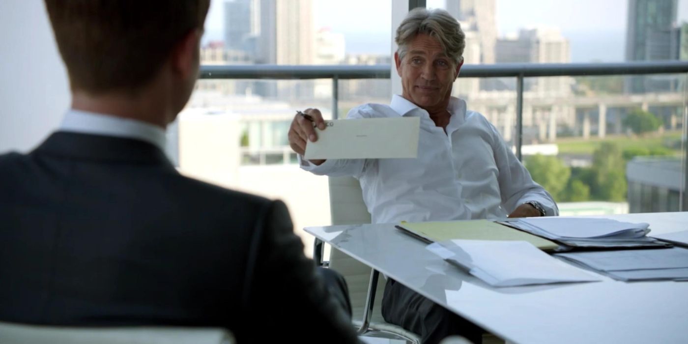 Eric Roberts as Charles Forstman handing Mike Ross an offer letter in 'Suits'