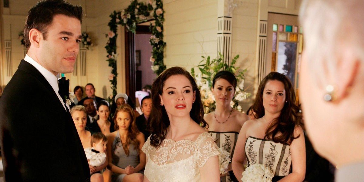 Paige (Rose McGowan) and Henry (Ivan Sergei) at the altar in Charmed Season 8