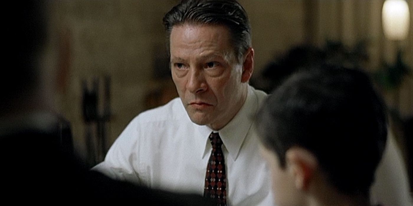 Chris Cooper as Alvin Dewey looking intently at someone off-camera in Capote