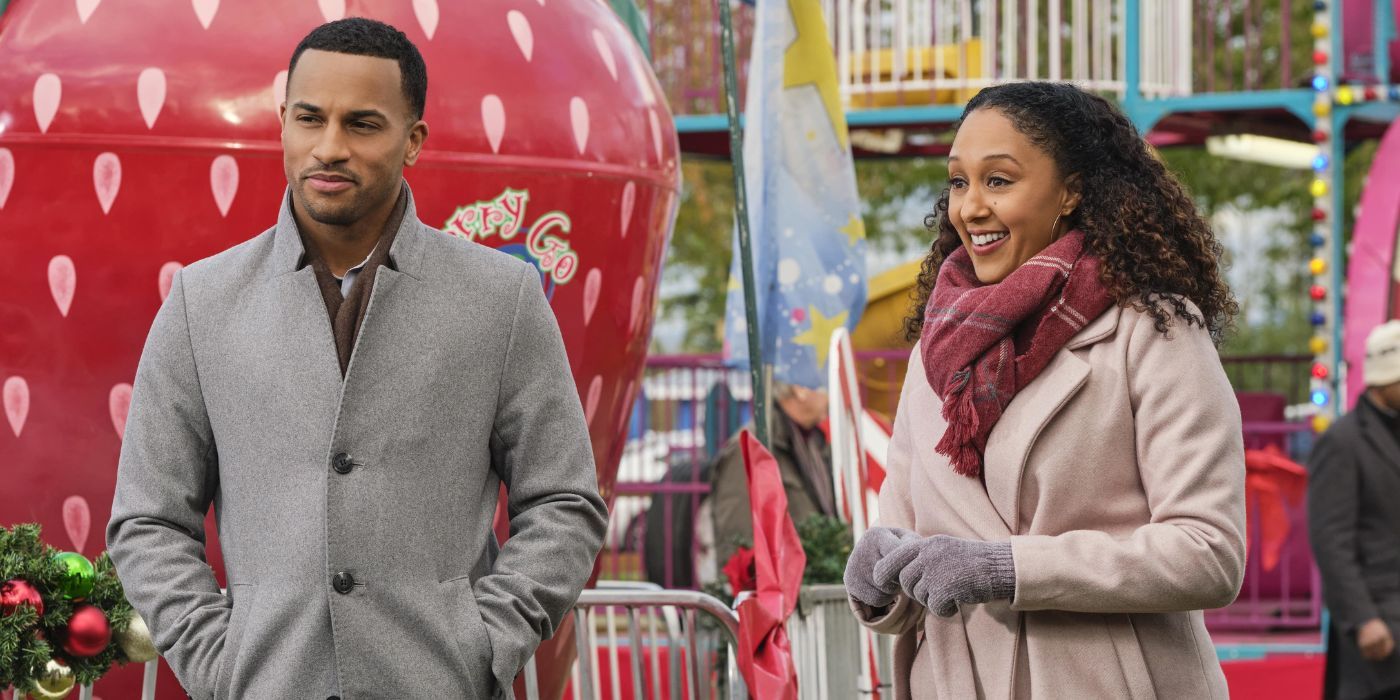 Tamera Mowry Housley and Michael D. Xavier in Christmas Comes Twice