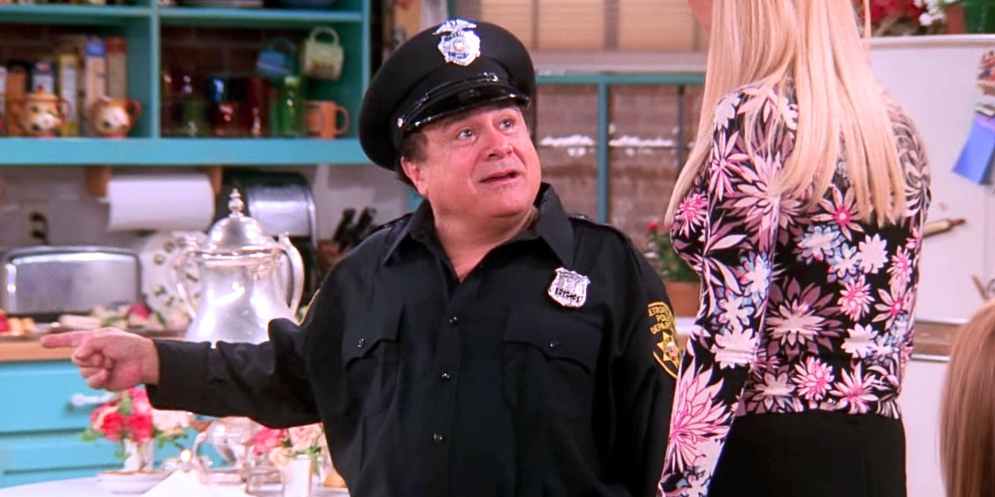 Danny DeVito talking to Lisa Kudrow in Friends