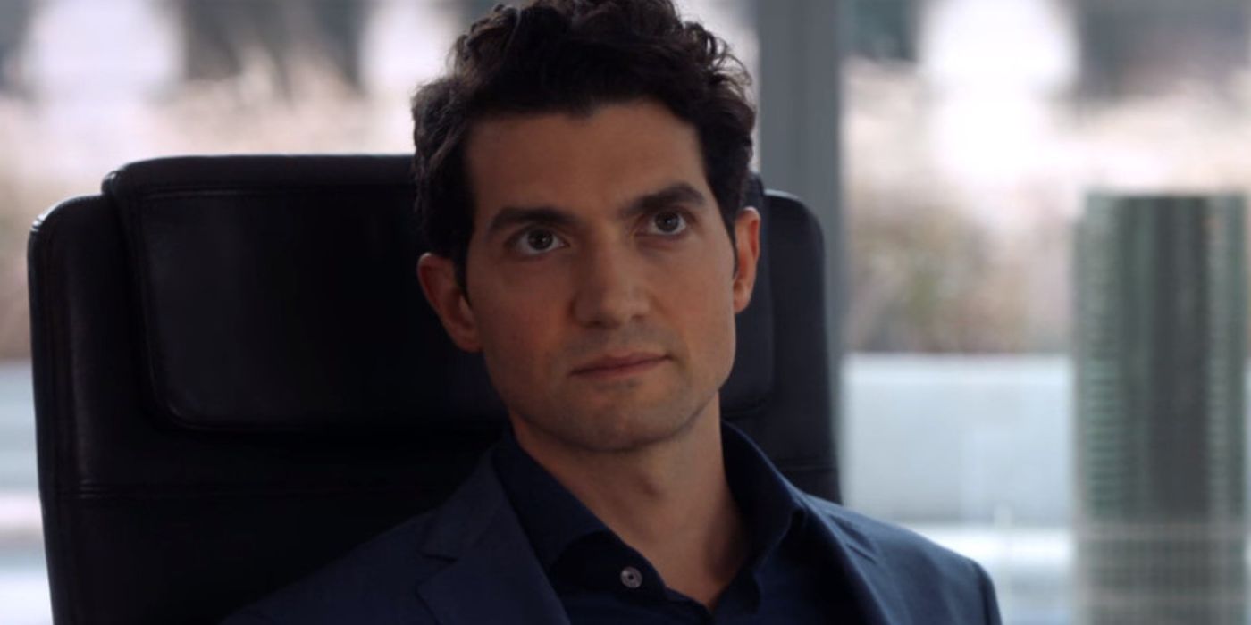 David Alpay as David Fox seated in a desk chair looking up in the legal drama 'Suits'