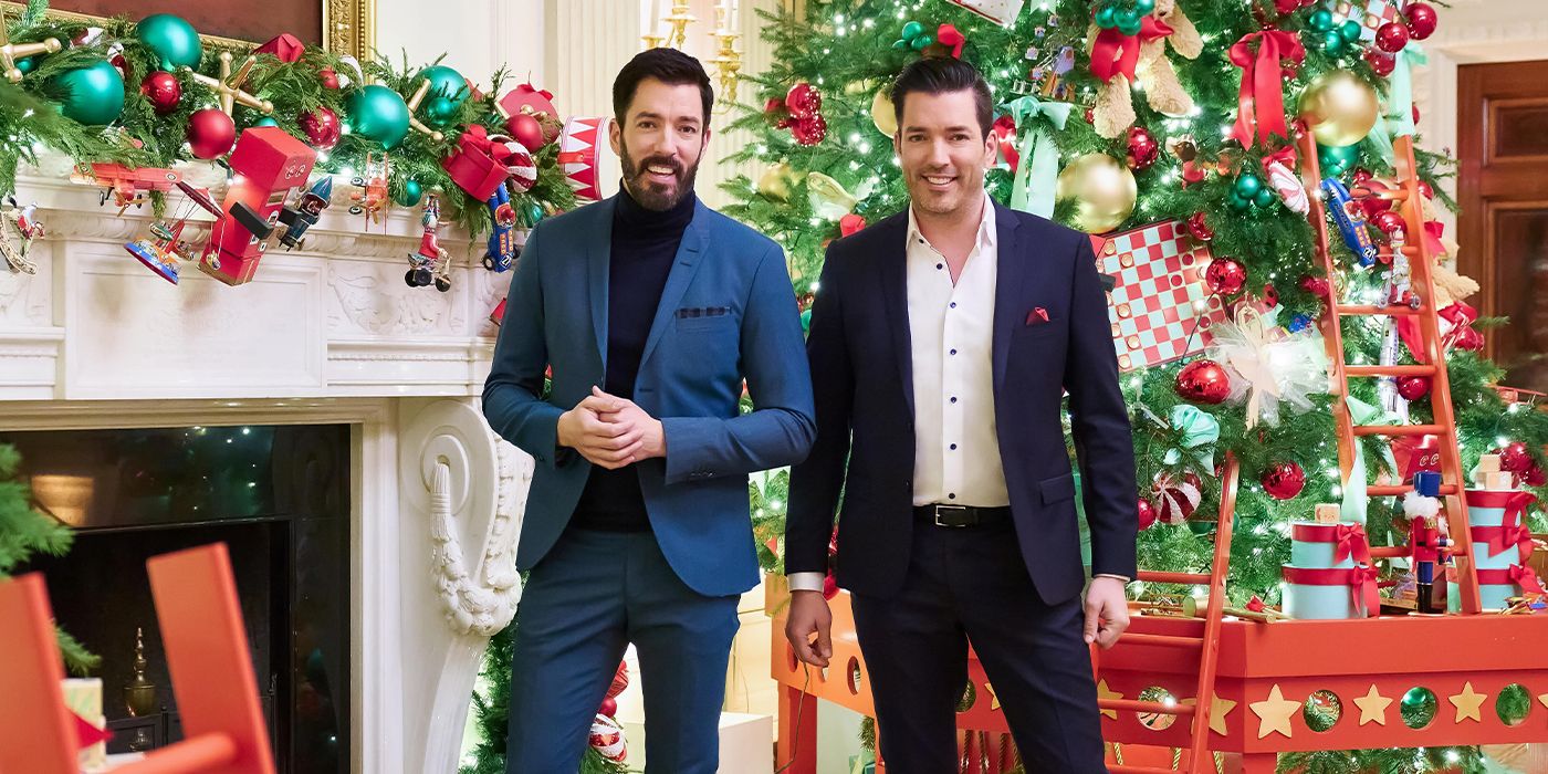 Drew and Jonathan Scott stand in front of a Christmas tree at the White House in the HGTV and Max special, White House Christmas 2023