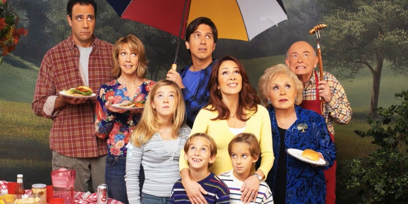 The cast of Everybody Loves Raymond looking upwards in a promotional photo for the show