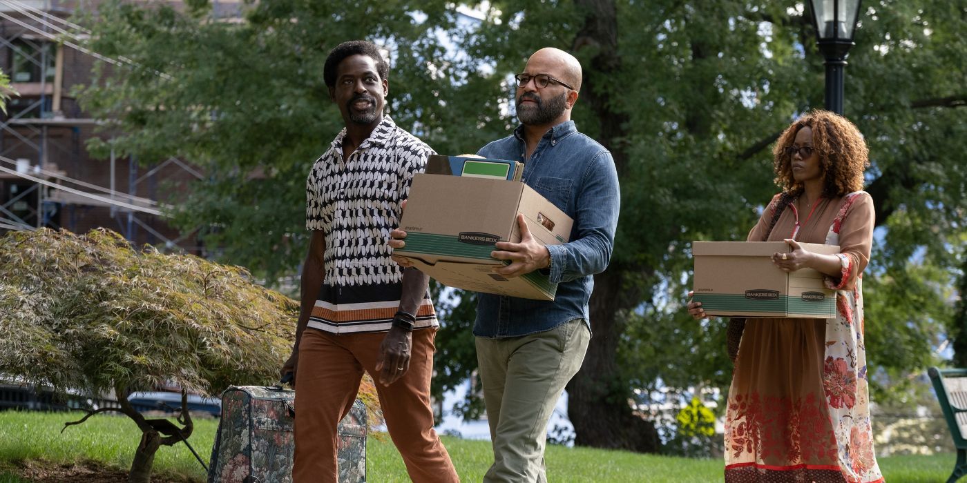 Cliff (Sterling K. Brown), Monk (Jeffrey Wright), and Coraline (Erika Alexander) carrying boxes in American Fiction