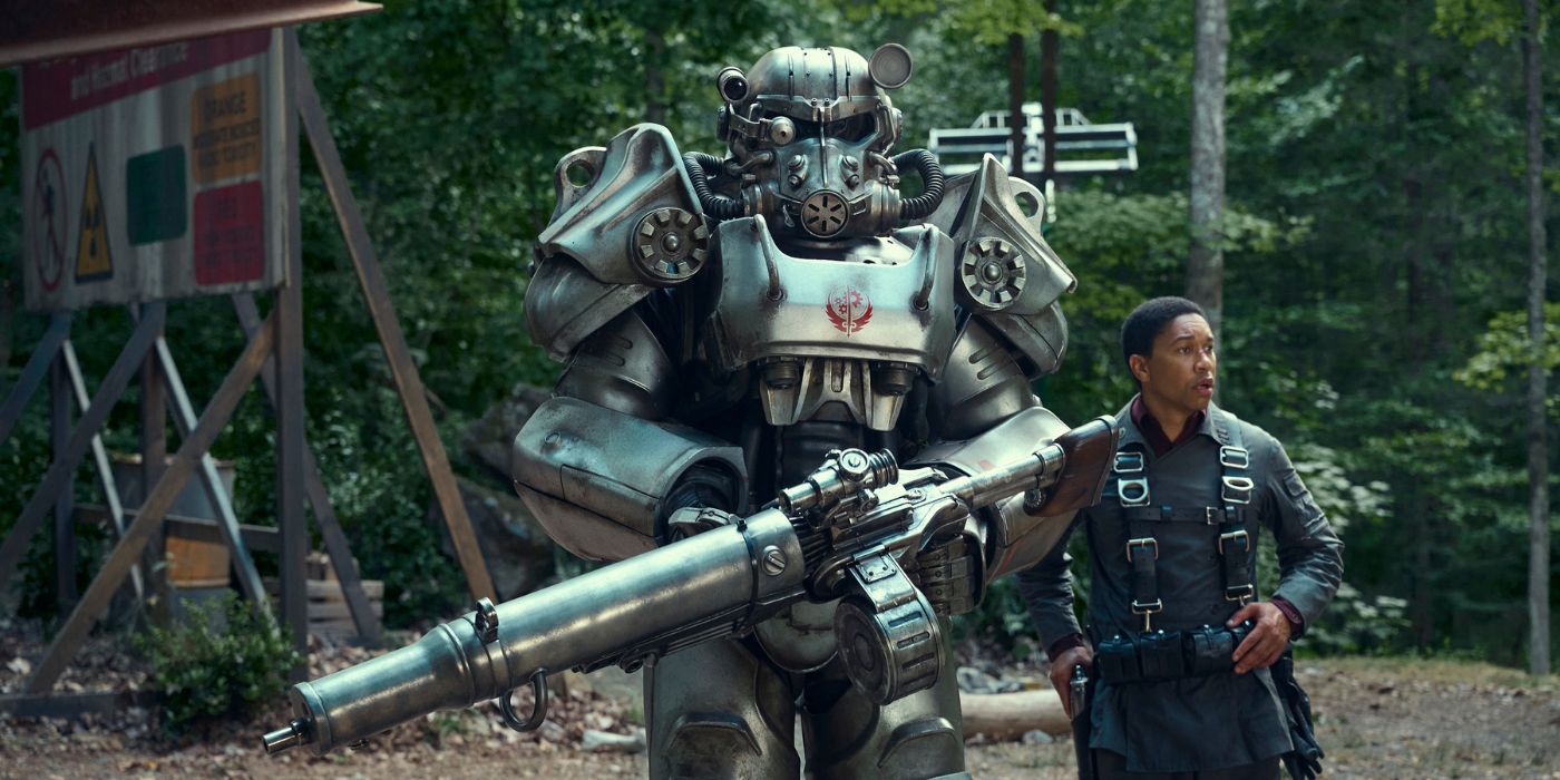 Aaron Moten as Maximus, standing next to some power armor in Fallout