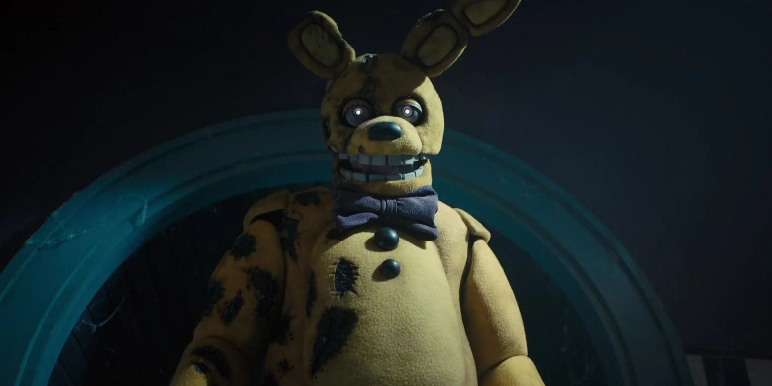 Matthew Lillard in costume as Springtrap, approaching the camera in Five Nights at Freddy's