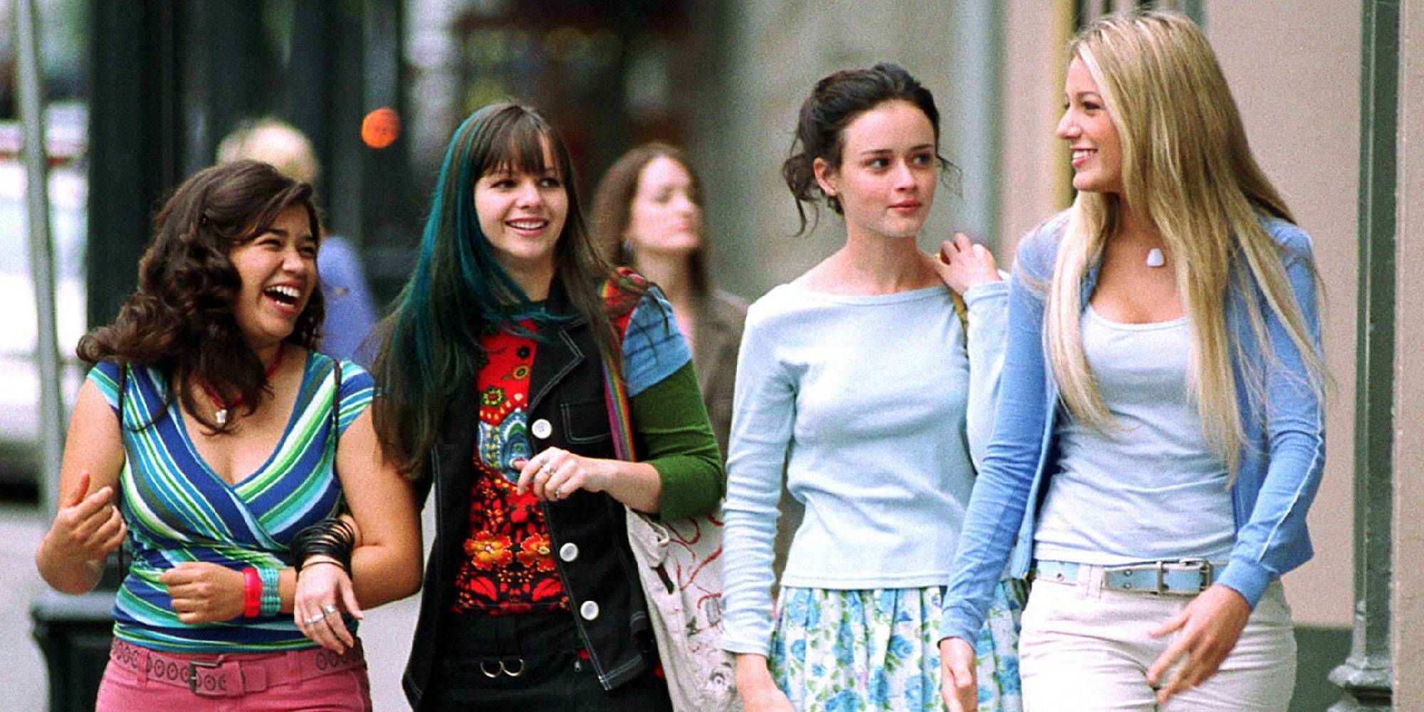 Four best friends walking together and smiling in The Sisterhood of the Traveling Pants
