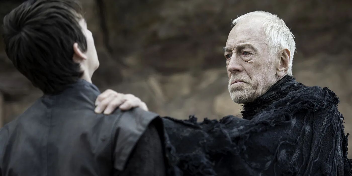 The Three-eyed Rave (Max Von Sydow) holds Bran (Isaac Hempstead Wright) by the shoulder in 'Game of Thrones'