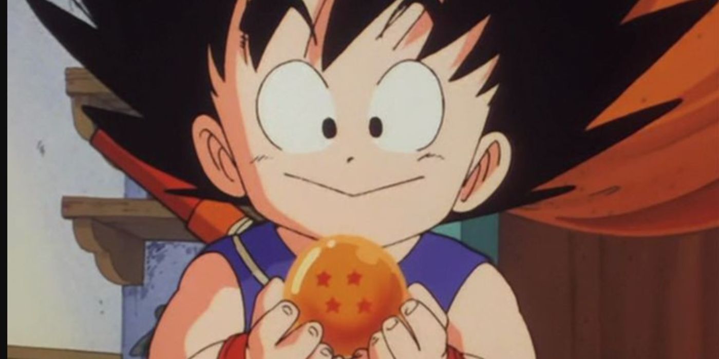 Goku holding the Four Star Dragon Ball.