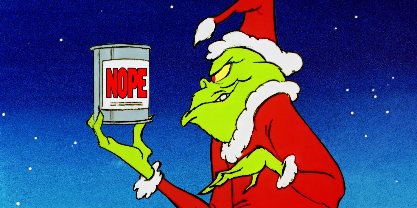 The Grinch holding a can that says NOPE on it