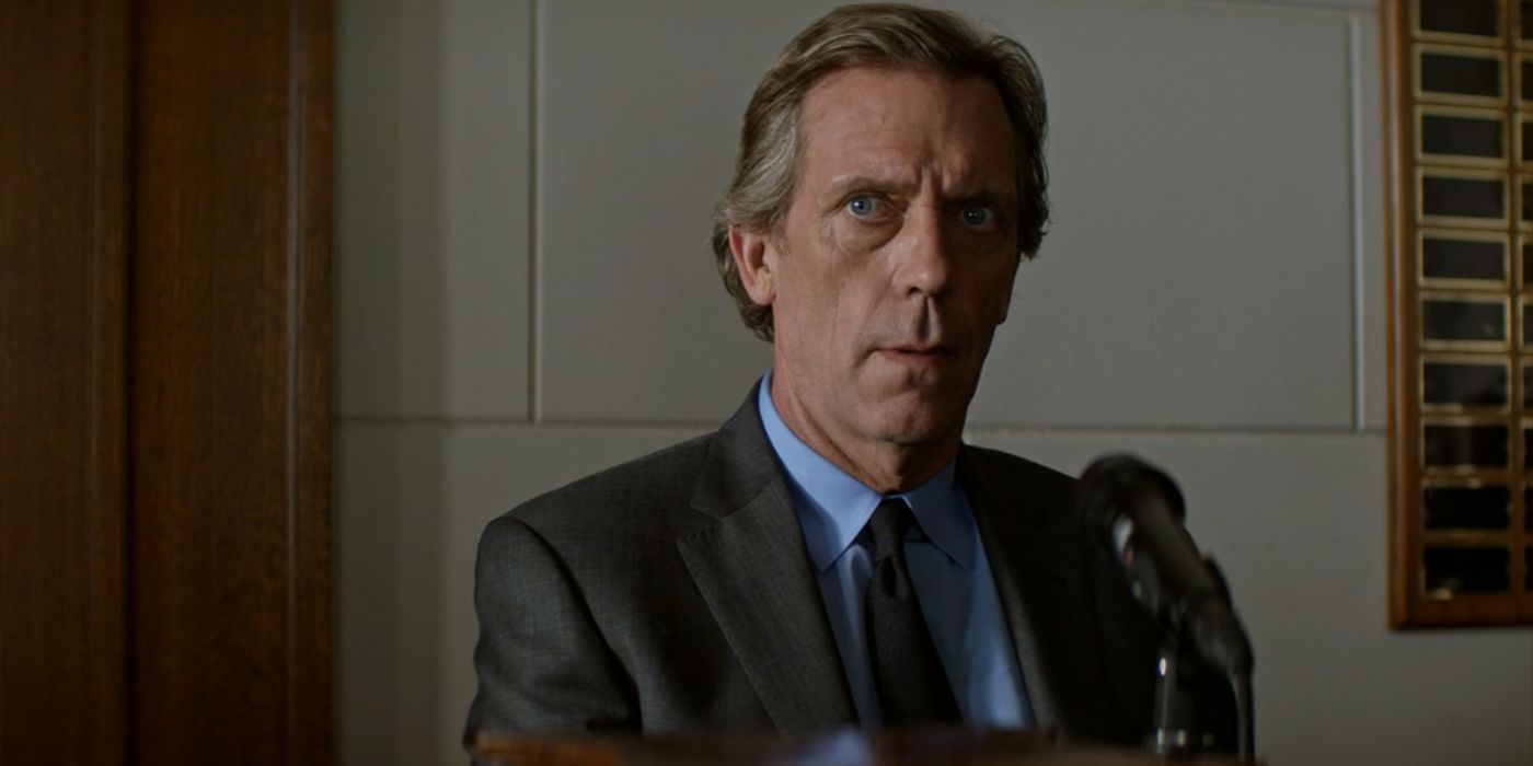 Hugh Laurie as a seated Eldon Chance wearing a suit and tie in the Hulu original series 'Chance'