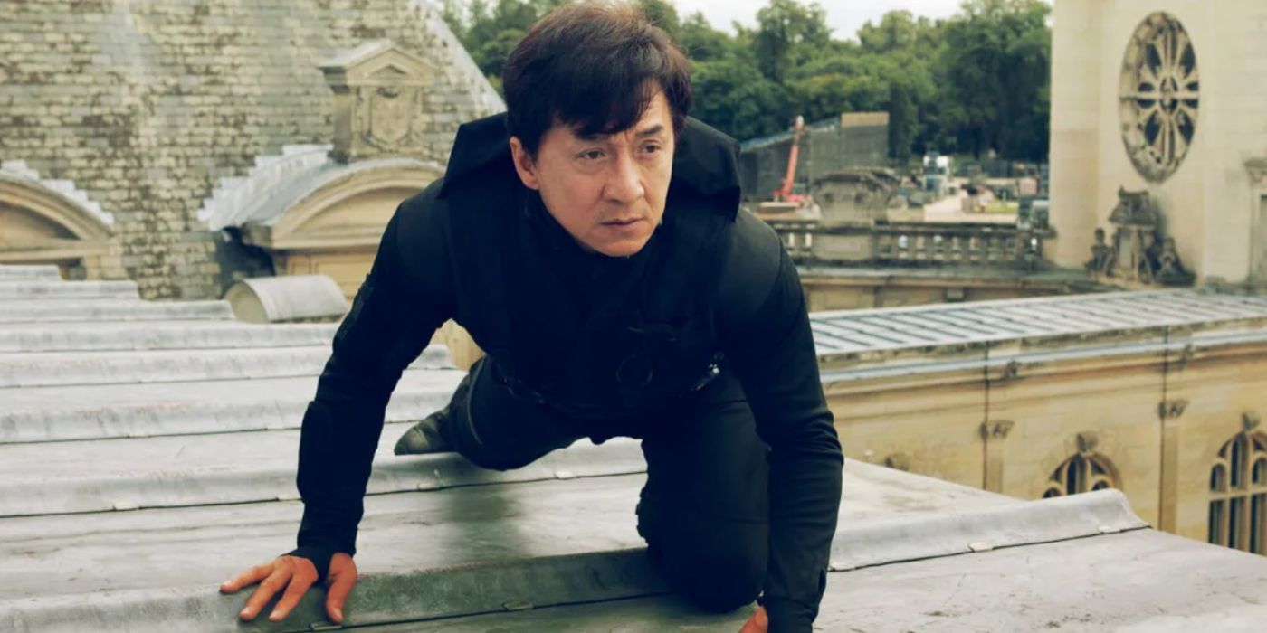 Jackie Chan as Asian Hawk crawling on a rooftop in 'CZ12'